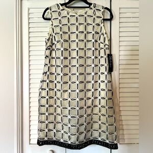 Cream colored dress with beautiful sheer patterned overlay